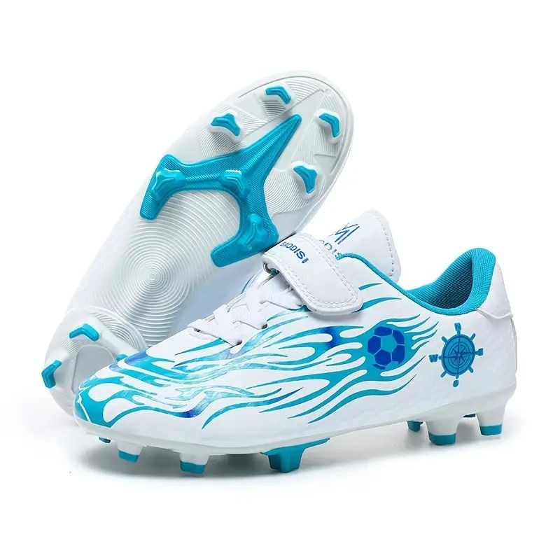 White and turquoise soccer cleats with flame and wheel designs, featuring rubber studs for traction.